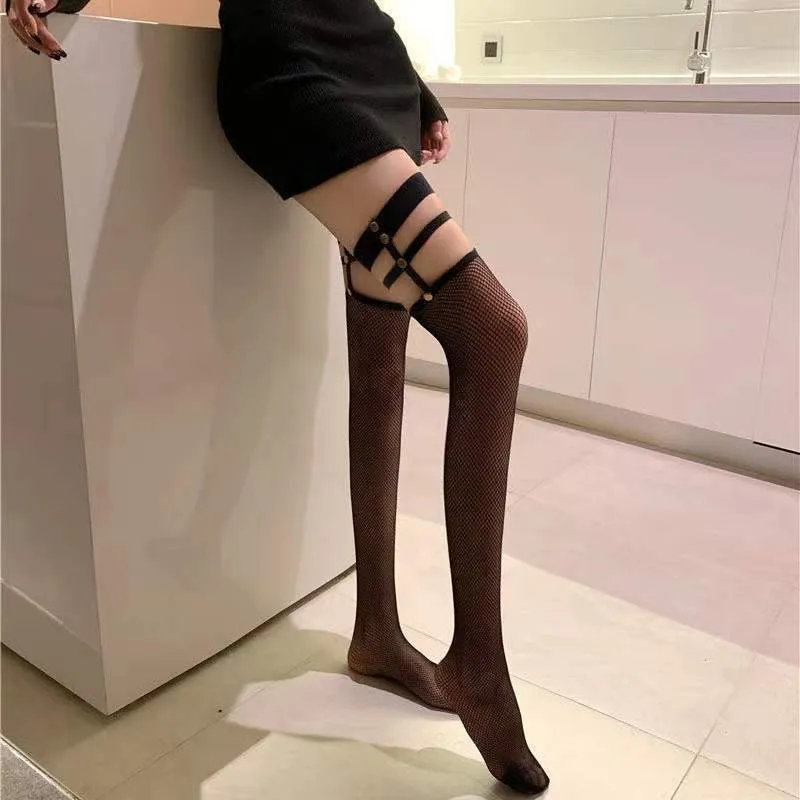 1 pair of rivet knee socks JK women's hollowed out fishing net socks Long tube sexy suspender stockings Dark punk rivet net sock